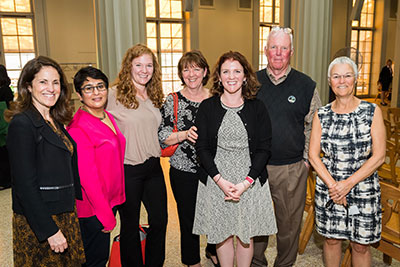 photo of IMA winner Kim Haberlin with colleagues and family members